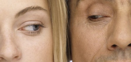 Older Man and Young Woman Cheek to Cheek